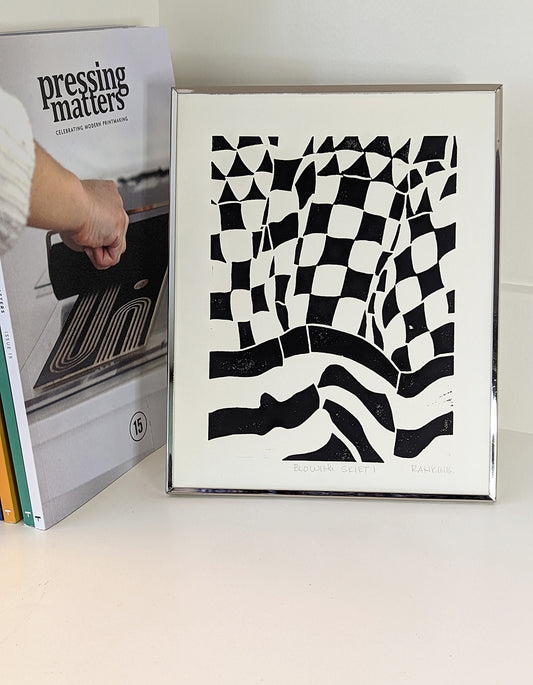 Blowing Skirt linocut framed