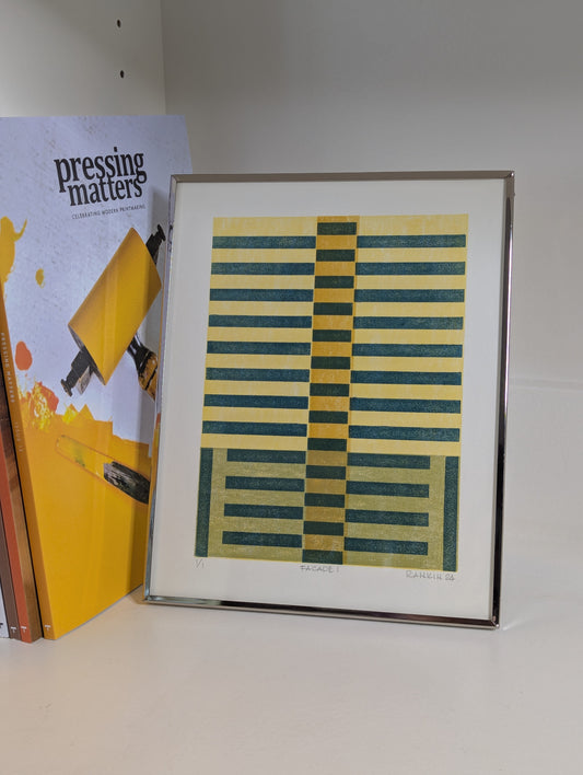 Framed abstract art print with geometric pattern