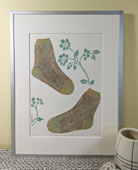 Ingrid's New Golf Socks collagraph print framed