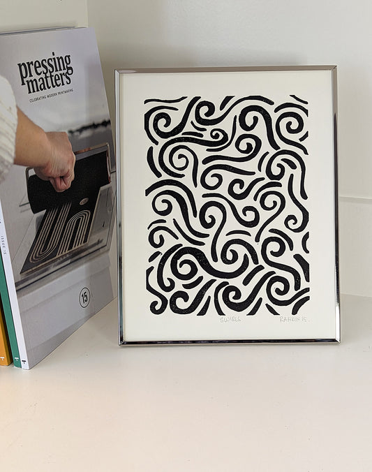 Swirls Linocut print framed