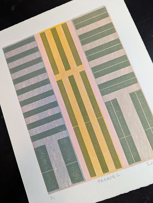 Art print with geometric striped design on a pink background