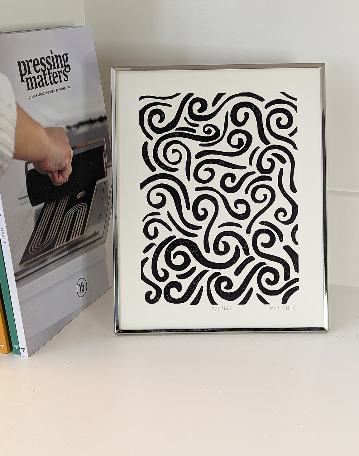 Swirls Linocut print framed