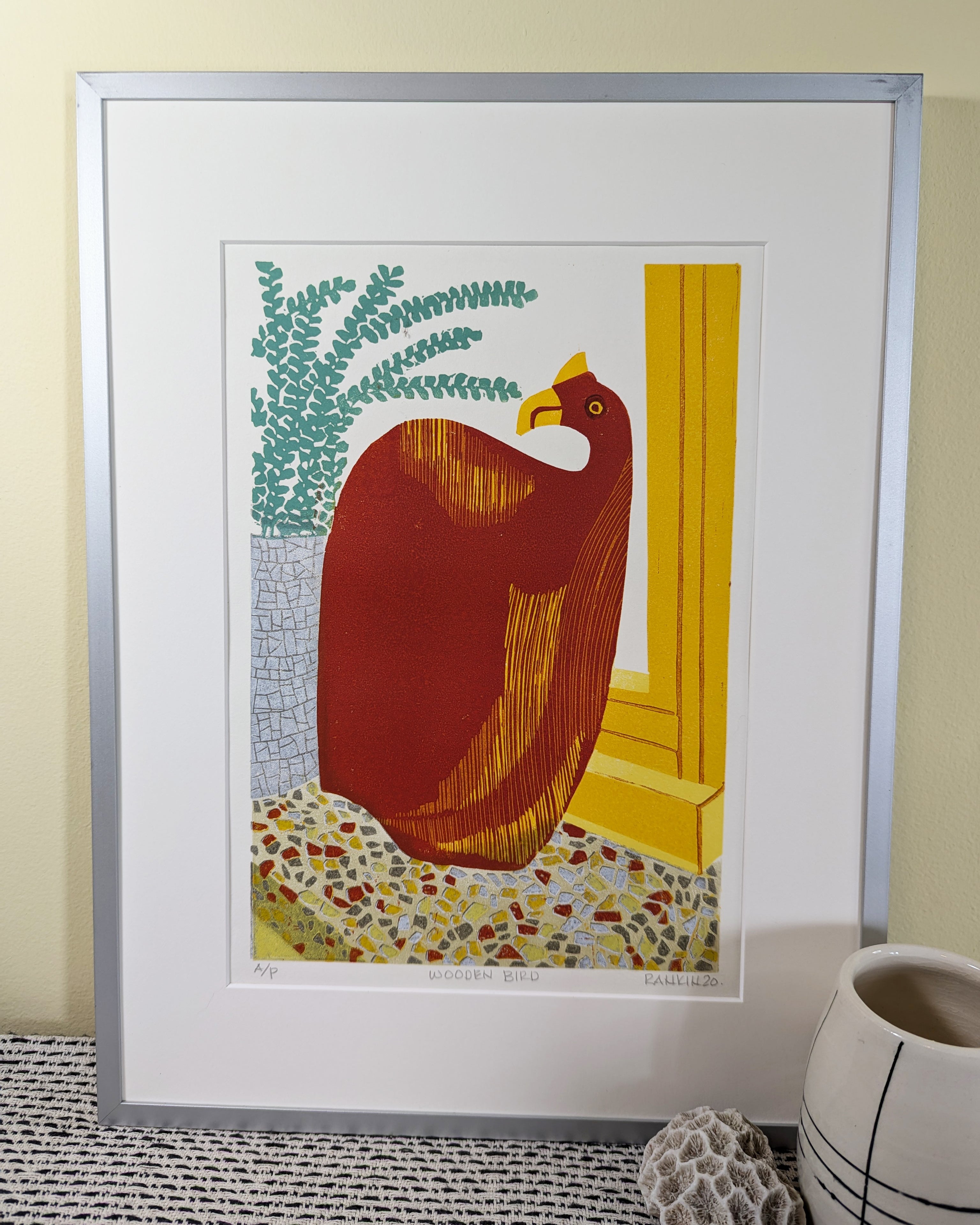 Wooden Bird reduction linocut print framed